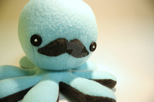 Blue mustache octo-plushie