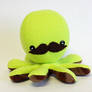 Lime green octopus plush with mustache