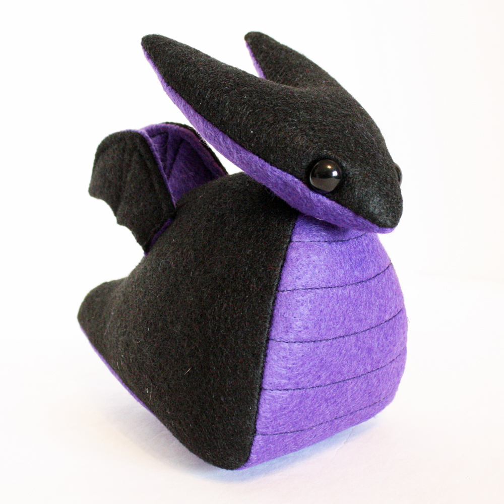 Purple and black dragon plushie