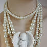 Cherub pearl necklace