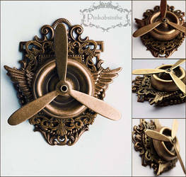 Propeller winged brooch pendant