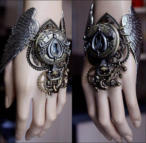 Winged watch cuff