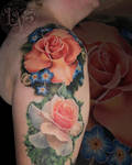 Rose sleeve tattoo by Liz Venom and Liz Cook.