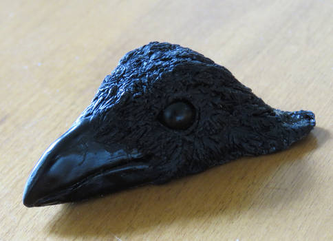 Small Raven head sculpture