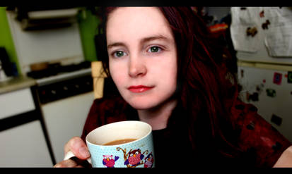 British Girl enjoying a fine spot of tea!