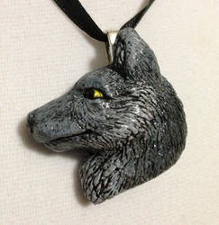 Dark grey wolf pendant