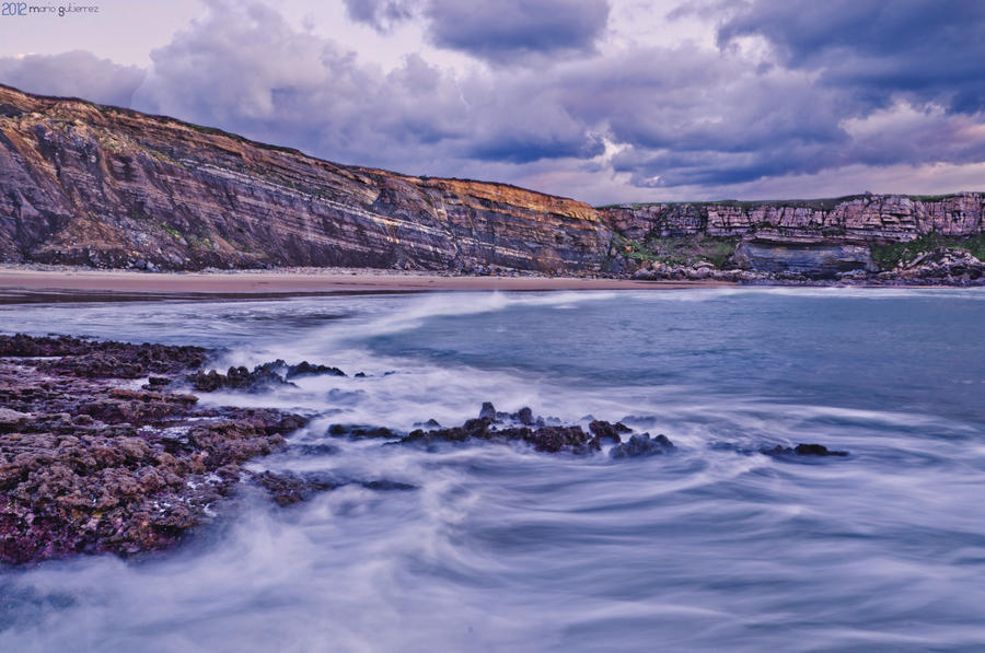 Beach and cliffs.