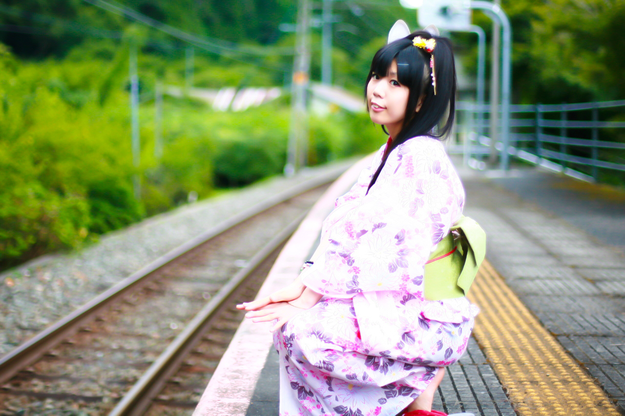 Yukata girl and railway