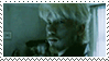 Kakihara exhaling smoke through his facial scars in Ichi the Killer.