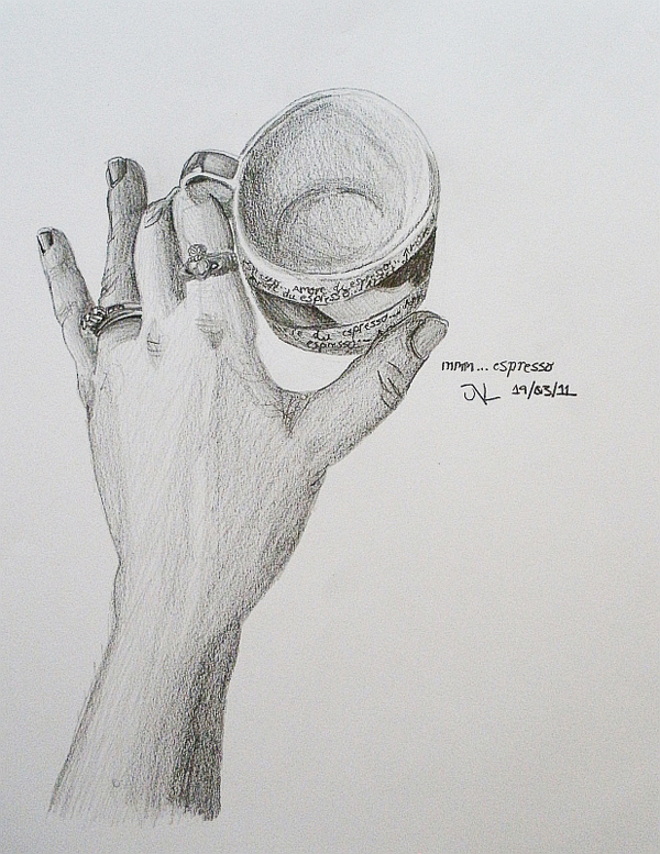 Hand and cup still life