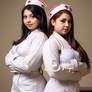 2-curvy-nurses-wearing-microskirt-straitjacket-nos