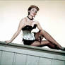 Corinne Calvet corset