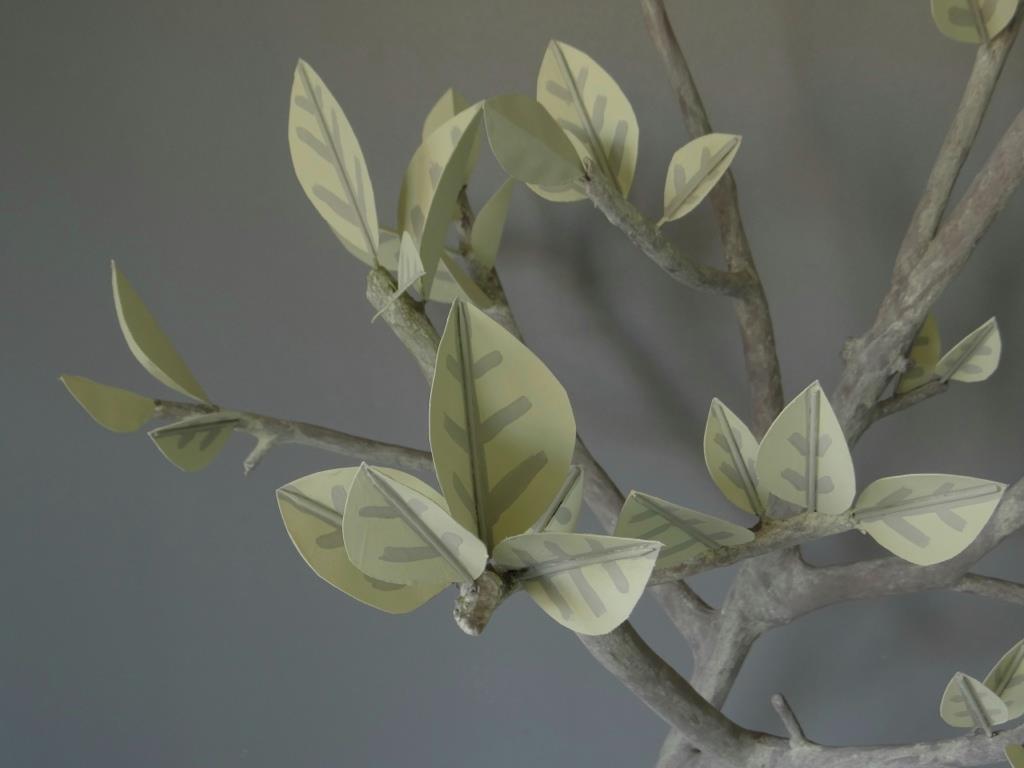 Tree made out of branches and cardboard