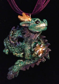 Chinese dragon pendant with gold ball