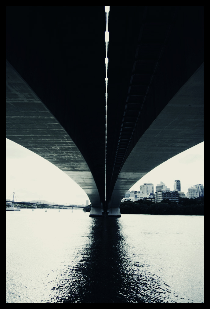 Under the bridge.