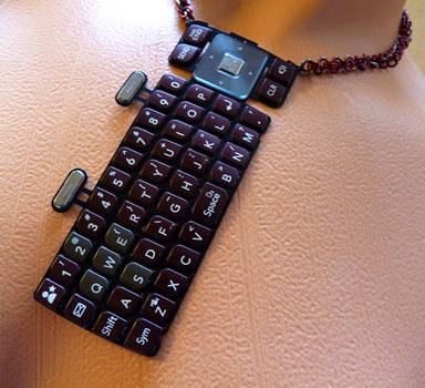 Red Cell Phone Keypad Necklace by Divulged