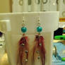 Feather earrings- red stars