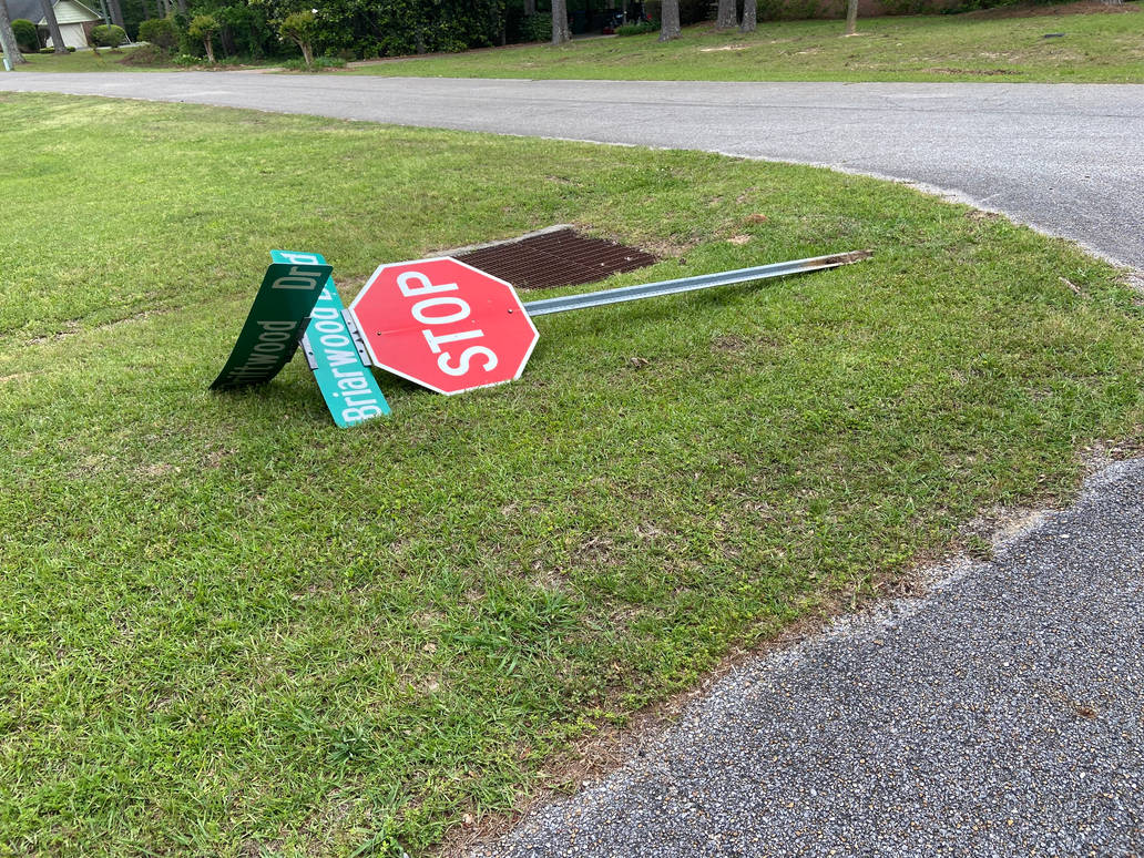 Stop sign fell over by Haros98 on DeviantArt