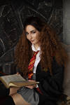 Hermione Granger Cosplay with book