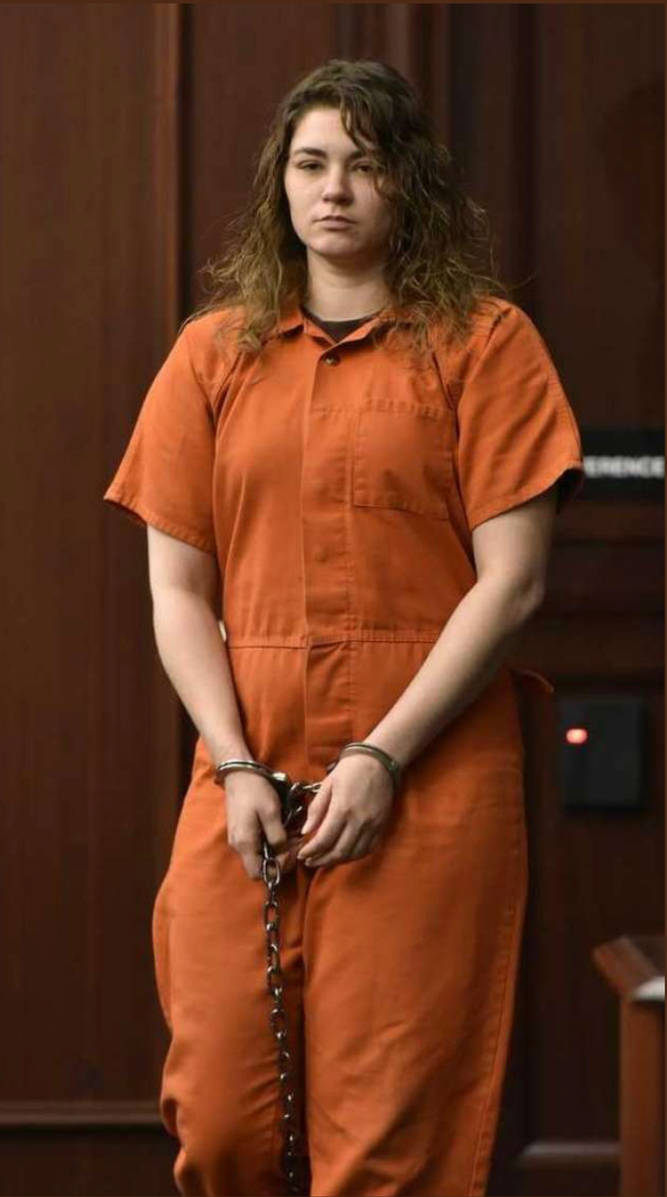 Woman in transport restraints in court by AshnaGopal on DeviantArt