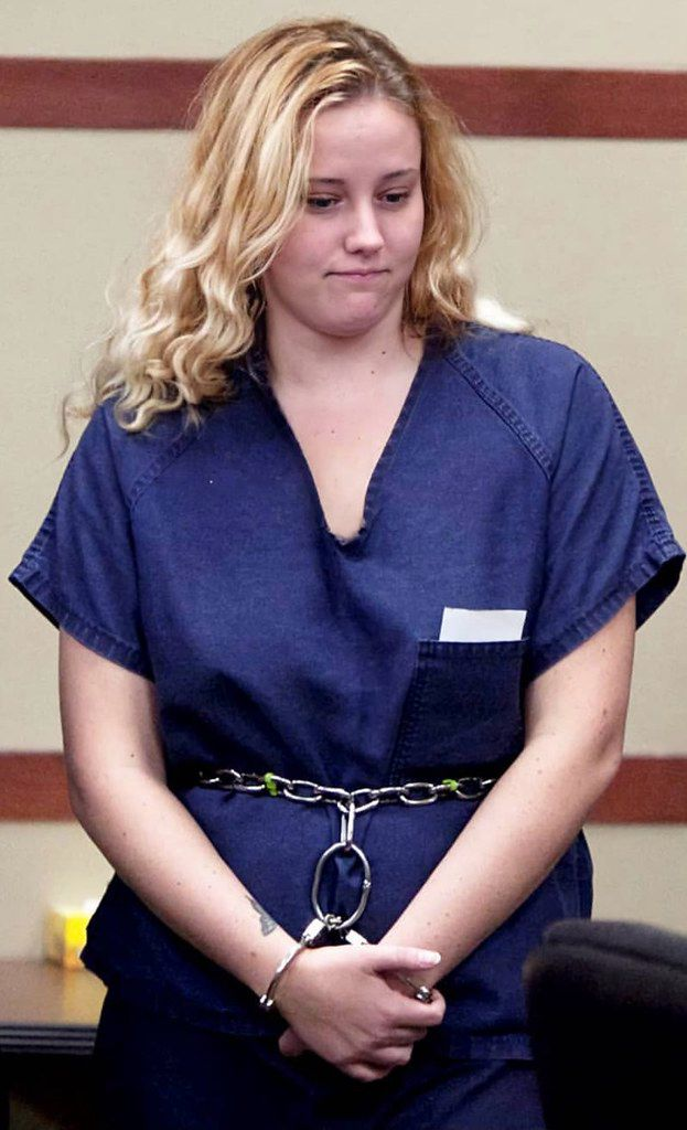 Female prisoner in transport restraints by AshnaGopal on DeviantArt