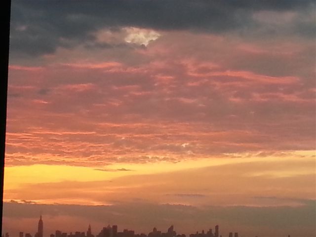 Cloudmaking UFO over Manhattan