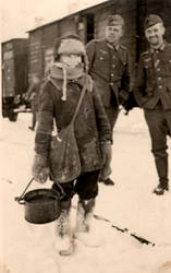 German soldiers with a children