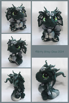 Green And Silver Baby Dragon