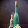 Glass bottles and petals