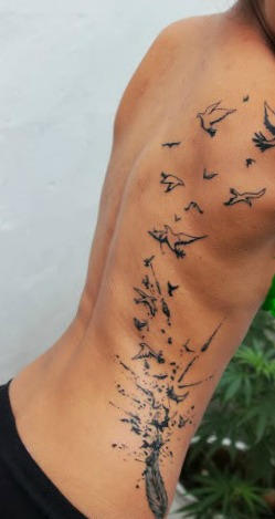 Feather-birds-ribs-shoulder-blade-women--tattoos-f by DramaQueen143 on  DeviantArt