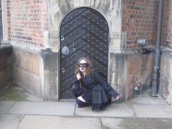 Girl at castle door