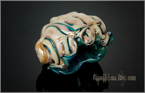 Organic beige golden turquoise seashell