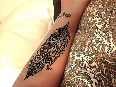 Tattoos by badasstatguy feather