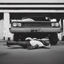 Man lying under the car 