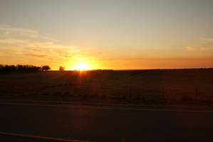 Lovely sunset background image driving dark road
