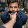 Chris Hemsworth in an alley