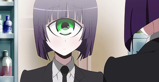 Manako with green contact lens