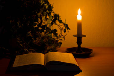 reading by candle light