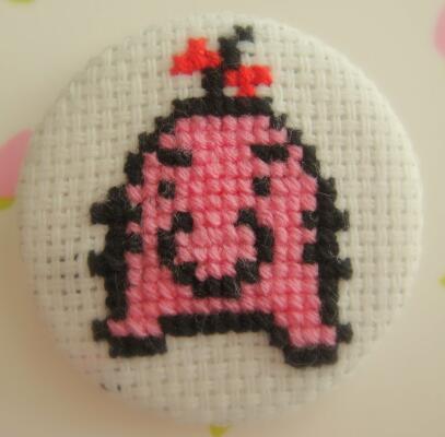 Mr. Saturn cross stitch pin