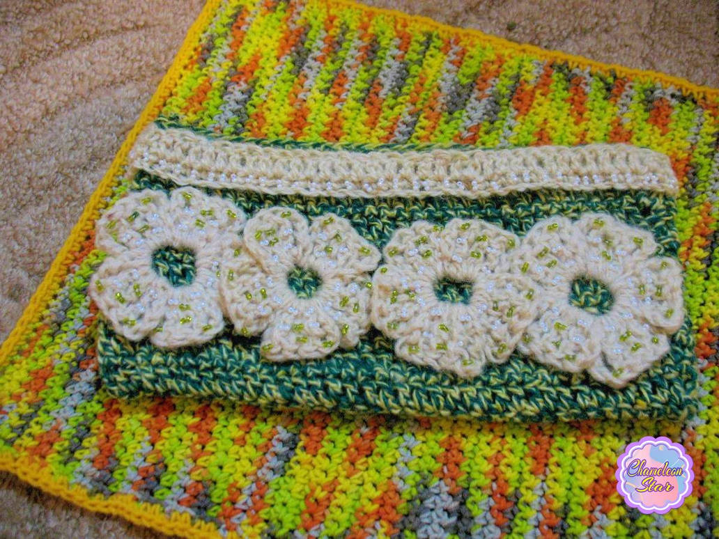 A WIP photo of handmade crochet green zipper pouch called Gloria