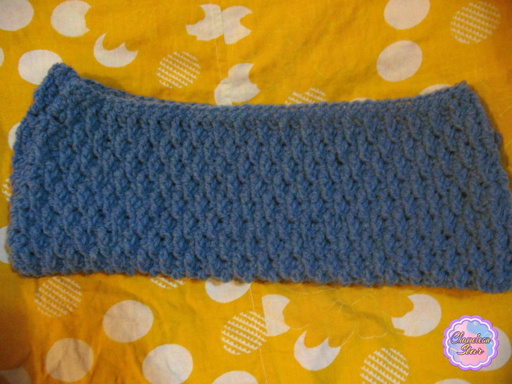 A WIP photo of handmade crochet gray zipper pouch called Angelika