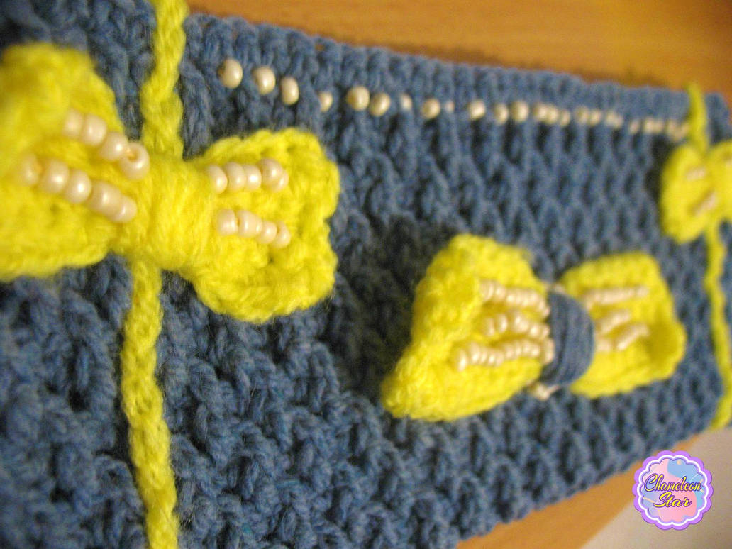 A WIP photo of handmade crochet gray zipper pouch called Angelika