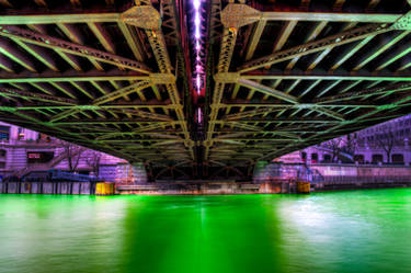 Intensely green river turns air purple
