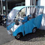 A Covered Mobility Scooter. 