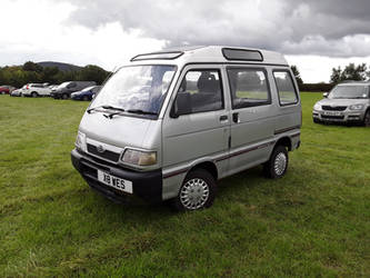 A Grey Daihatsu Van (Year 2000 or 2001).