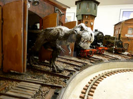 curious T-Rex explores train-depot