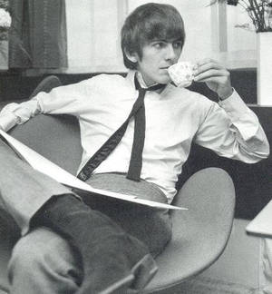 George drinking tea