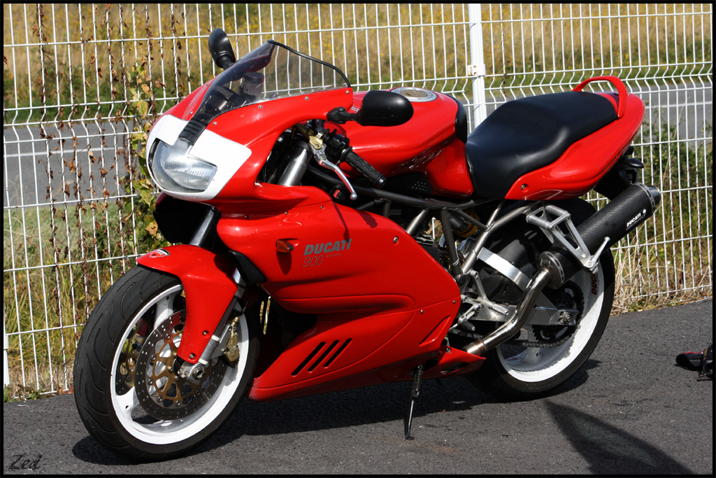 Ducati 900 behind bars