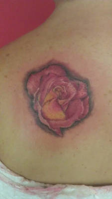 Realistic rose tattoo