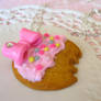 Kawaii frosted cookie with bow necklace